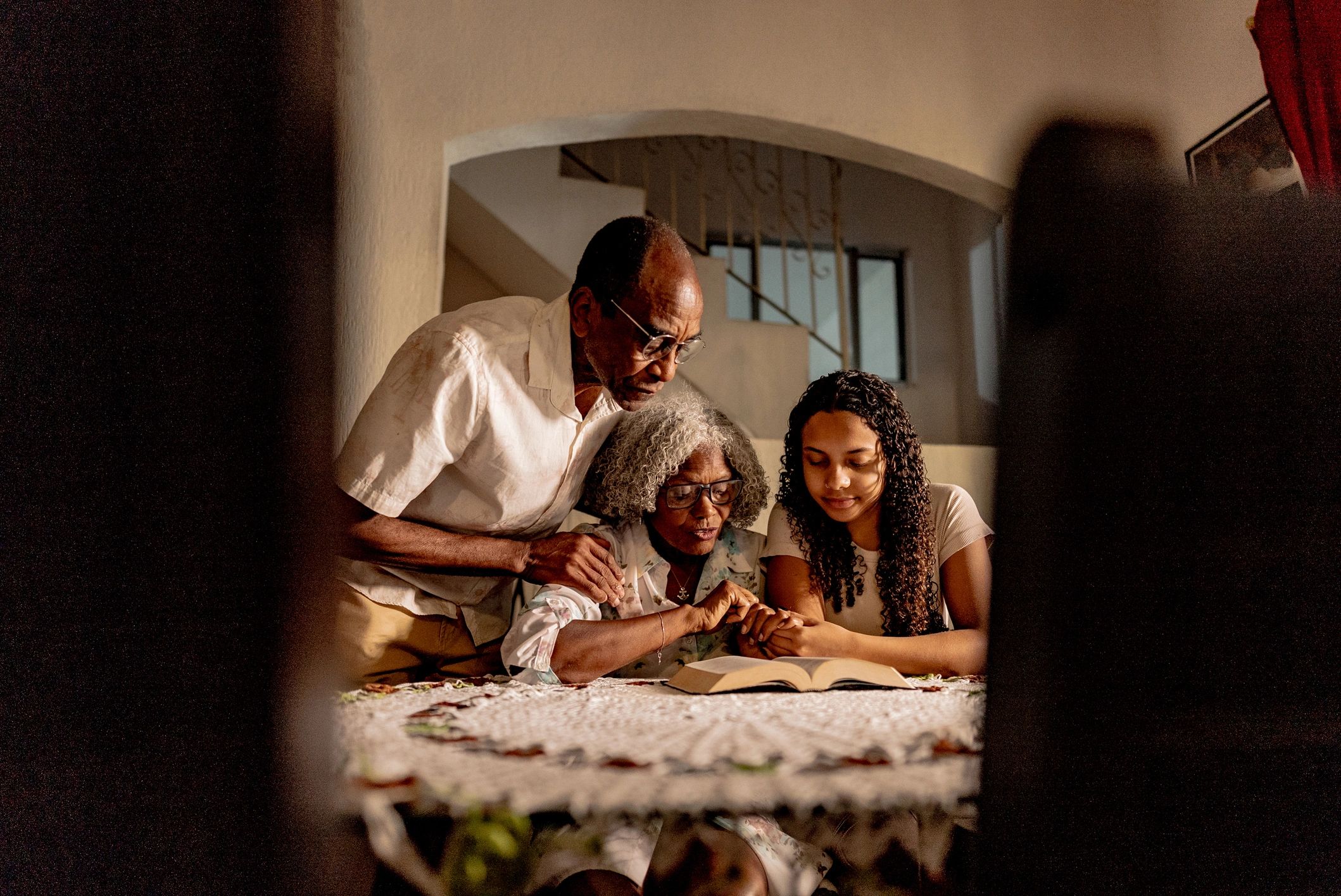 Family enjoying preserved home video memories